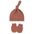 Close-up of baby knot hat and mittens set in terracotta reddish-brown knit fabric. - One Size / Dark Orange