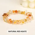 Elastic charm bracelet featuring irregular polished natural red carnelian stone chips - 5-8mm / Red Agate