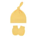 Close-up of soft yellow cotton baby knot hat and matching anti-scratch mittens set - One Size / Yellow