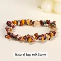 Bracciale elastico con perle irregolari di pietra naturale color tuorlo d'uovo - 5-8 mm / Diaspro Giallo