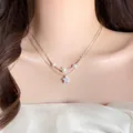 Elegante zilveren gelaagde ketting met witte parels en een fonkelende ster hanger dames - Zilveren Ster Kunstparel Gelaagde Ketting