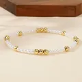 Elegant white imitation pearl stretch bracelet with gold accent beads for women's style - Artificial Pearl Gold Beads Alternating Style (FP3372)