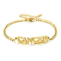 Detailed view of the gold Figaro chain anklet featuring a Cancer zodiac nameplate pendant. - Cancer / Gold