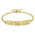 Detailed view of 18K gold plated Capricorn zodiac nameplate on Figaro chain anklet - Capricorn / Gold