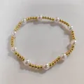 Elegant elastic beaded bracelet featuring white faux pearls and gold spacers for women - Gold and White Artificial Pearl Style (BJEW-SW001592-05)