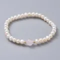 Elegant faux pearl stretch bracelet with central pink crystal bead and gold spacers. - Artificial Pearl Pink Crystal Style (X-BJEW-JB04623-01)