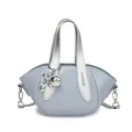 Fashionable light blue water bucket handbag with silver handles and metallic balloon dog charm - Single Bag / Blue