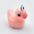 Detailed view of a small pink resin duck pendant charm for DIY jewelry accessory - Korean Pink