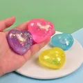 Colorful heart-shaped glitter squishy stress relief toy for sensory play and relaxation - Aurora Maltose Heart Style