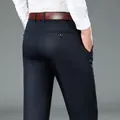 Pantaloni casual business da uomo premium in blu navy con cintura in pelle marrone - 34 (2.7 Piedi) / Pantaloni e gonne / Blu Marino (Regolare)