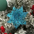 Close-up of blue glitter hollow-out poinsettia flower for Christmas tree decoration - Lake Blue