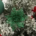 Close-up detail of a festive green glitter hollow-out poinsettia Christmas flower - Grass Green