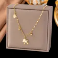 Gold-tone clavicle necklace with a cute horse pendant and lucky charms shown on box - Lucky Horse Style (H1019)