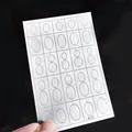 Close-up of translucent oval nail art stencil sticker for French manicure design - Hollow Oval Style (F-17)