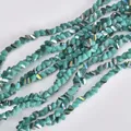 Close-up of 4mm triangular electroplated teal crystal beads for DIY jewelry - 4mm (120-125 Pcs) / Cyan