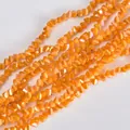 Macro detail of 4mm orange faceted triangular glass beads with electroplated finish - 4mm (120-125 Pcs) / Orange