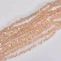 Close-up detail of 4mm champagne triangular faceted crystal glass beads for DIY jewelry. - 4mm (120-125 Pcs) / Apricot