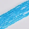 Macro view showing the texture of sky blue triangular faceted crystal beads for DIY - 4mm (120-125 Pcs) / Lake Blue