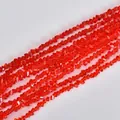 Macro shot of vibrant 4mm orange faceted triangle crystal beads for DIY jewelry - Red
