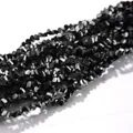Detailed view of 4mm black triangular faceted electroplated glass crystal beads for DIY jewelry - 4mm (120-125 Pcs) / Black