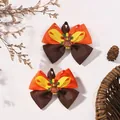 Two festive Thanksgiving turkey ribbon hair bows for girls in orange and brown - Style B / Tan