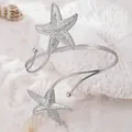 Exquisite silver starfish open arm cuff bracelet featuring beach vacation and ocean style - Silver