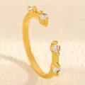 Macro view of gold-plated adjustable ring band set with brilliant white zircon stones. - Prong Set Four-Diamond Open Style (3262) / Medium KC Gold (3262)