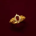 Elegant vintage court style ring with oval red gemstone and white zircon in gold finish - Gold
