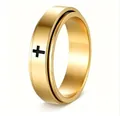 Close-up of rotatable stainless steel ring with black cross design in gold finish - Size 5 / Gold