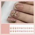 Elegant French press-on nails set with gold floral designs and pearls, 24 pieces kit - Jelly Glue Type / FZ308-B7Q Golden Flower Pearl