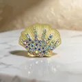 Detailed close-up of a matte gold shell brooch with sparkling iridescent crystals - 3.4*3.9cm / Yellow