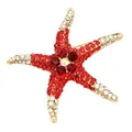 Close-up of a luxury vintage starfish brooch featuring vibrant red and white rhinestones - Red Style Rhinestone Starfish