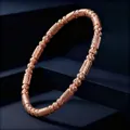 Elegante bracciale rigido testurizzato in acciaio inossidabile oro rosa per donna, chic. - Oro rosa