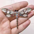 Elegant gold-tone dragonfly brooch featuring colorful rhinestones and white cat-eye stones - Colorful Rhinestone Dragonfly (XH-004)