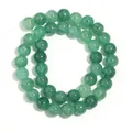 Primo piano di perle in vetro craquelé verde smeraldo per la creazione di gioielli fai da te - 10mm (Circa 38 Perline) / Verde Agata Floreale
