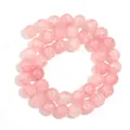 Vista dettagliata di perle tonde in vetro cracklé rosa per la creazione di gioielli - 10mm (Circa 38 Perline) / Fiori Acquerello