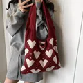 Trendy burgundy knitted shoulder bag with white heart pattern and large capacity design - Burgundy