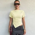 Modern slim-fit pale yellow short-sleeve T-shirt with chic asymmetrical hem detail. - Light Yellow