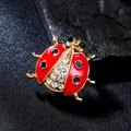 Vibrant red enameled ladybug brooch featuring sparkling crystal rhinestone accents - Four-Star Beetle (XD825370)