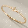 Elegant gold starfish bangle with sparkling pave crystals for beach resort styling. - Gold (BS-J5658G)