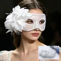 Elegant white lace Venetian masquerade mask with a large gauze flower decoration. - One Size / White