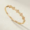 Elegant gold-plated copper bangle with sparkling zircon inlaid flower charms for women - Gold Luxury Flower Style (BS-J5577G)