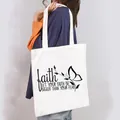 Close-up detail of a white canvas tote bag featuring an inspirational butterfly faith print. - Faith Butterfly Style (10)