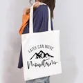 Detail of white canvas tote with 'Faith can move mountains' text and mountain graphic - Faith Can Move Mountains Style (6)