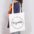 White canvas tote bag with Waymaker print held by a person in a lifestyle setting - Waymaker Circle Style (4)