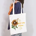 Close-up of women's white canvas tote bag with sunflower and motivational Christian quote - Sunflower Joy Style (2)