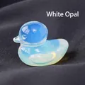 Hand-carved opalite duck figurine with blue translucent finish - Opalite