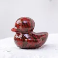 Hand-carved natural red sesame stone duck figurine with a polished glossy finish - Red Sesame Jasper