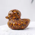 Exquisite hand-carved Gold Silk Jade duck figurine with unique natural patterned texture. - Gold Silk Jade