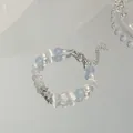 Bracelet de perles élégant avec pierres bleues et blanches et étoiles argentées - Style étoile à cinq branches bleu et blanc (S429)